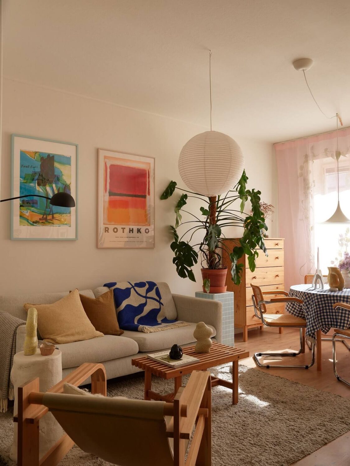A Small Light Filled Apartment with Plants and Color 3 light scandinavian living room nordroom