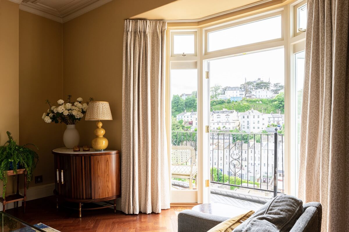 Colorful Interiors and Wallpapers in a Victorian House 4 living room bay window