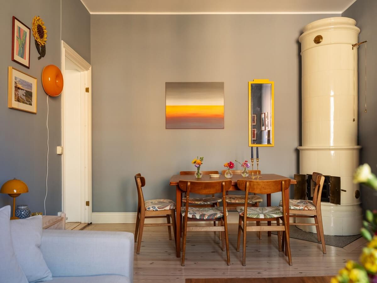 A Light Apartment with a Sunny Balcony 6 living room fireplace and dining table