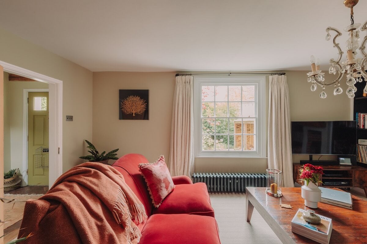 Colorful Rooms in an Elegant Georgian Home in England 2 living room with red sofa
