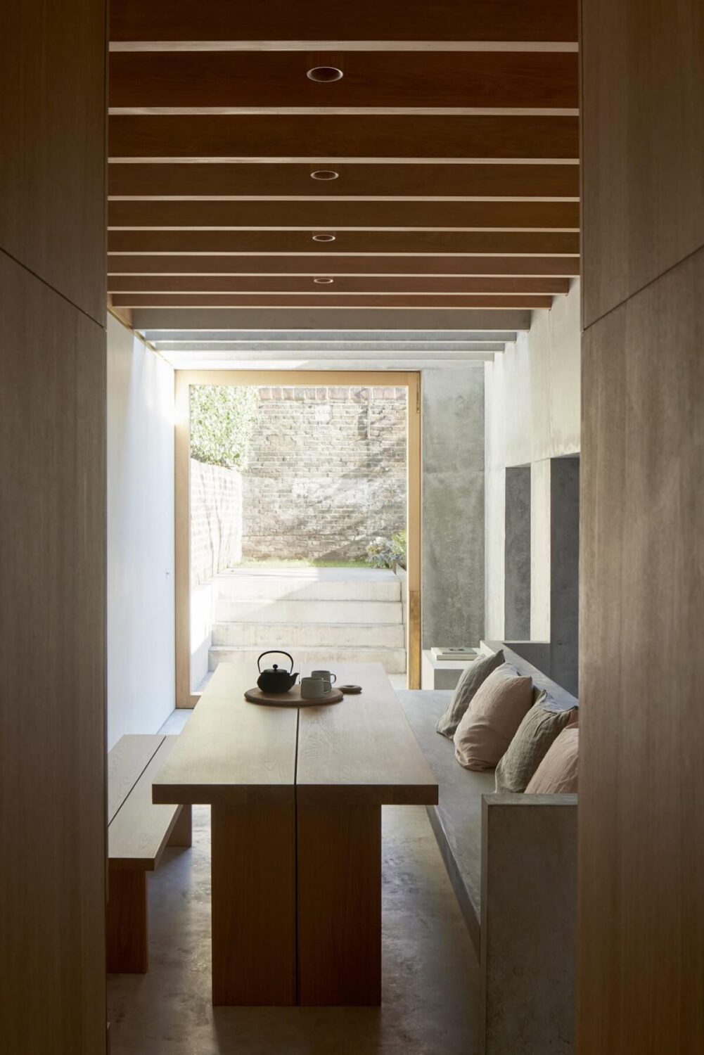 A Georgian Townhouse with a Modern Concrete Extension 8 modern wood concrete dining room