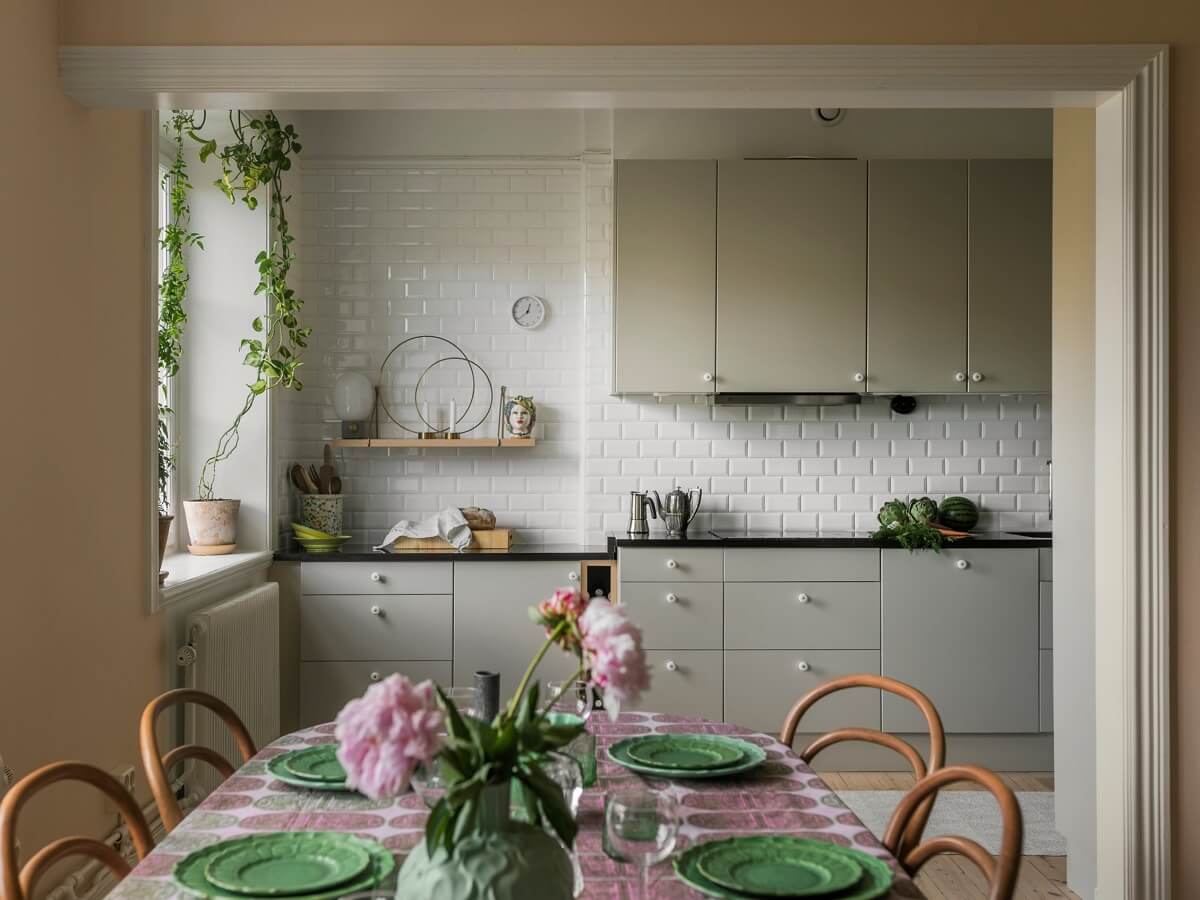 A Light Atmosphere and Wallpapers in a Swedish Apartment 7 open plan kitchen dining room