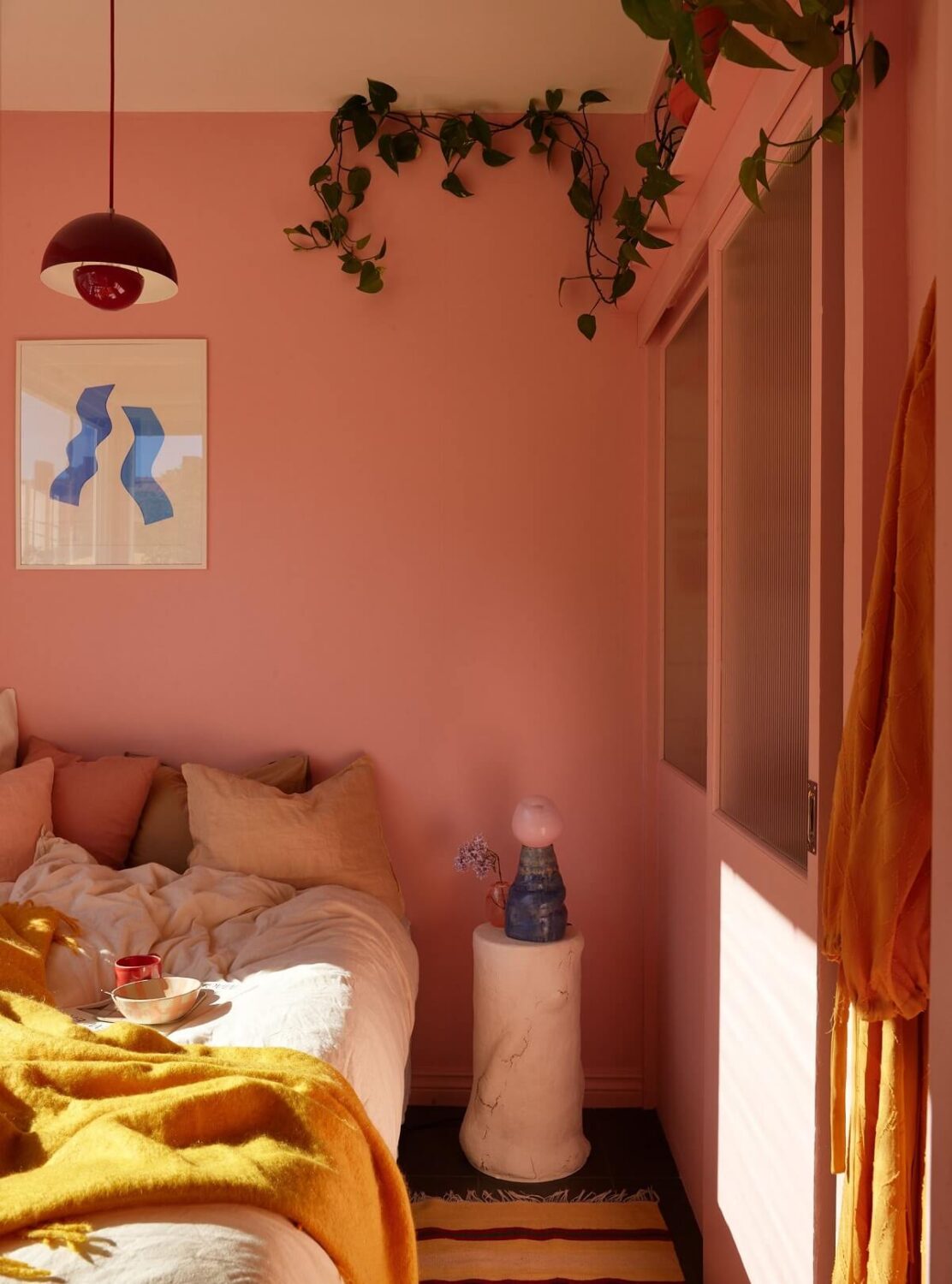 A Small Light Filled Apartment with Plants and Color 14 pink bedroom with plants nordroom