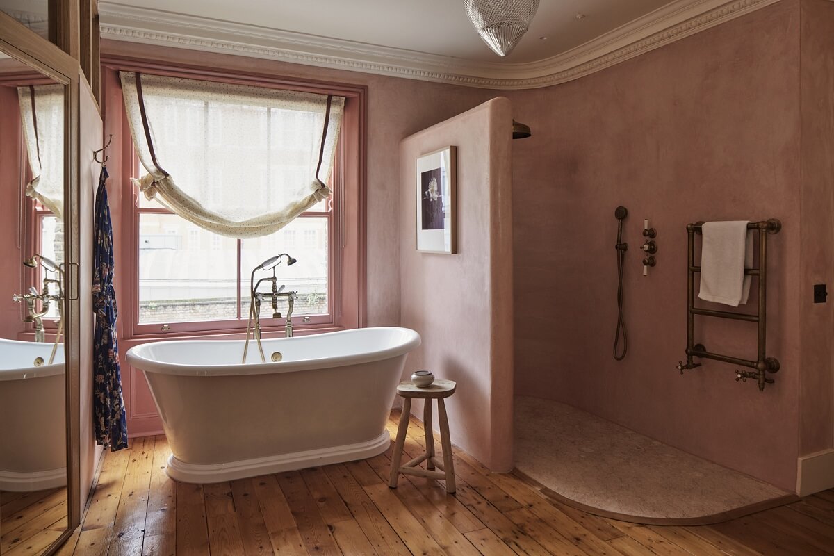 Limewash Paint and Artisan Wallpaper in a London Townhouse 31 pink plastered walls bathroom walk in shower bath and wooden floor nordroom