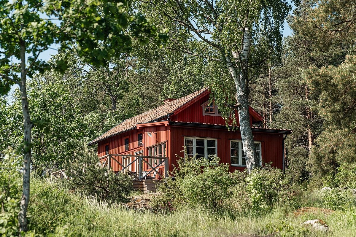 A Charming Historic Home with Views of the Lake 12 red swedish house in the woods