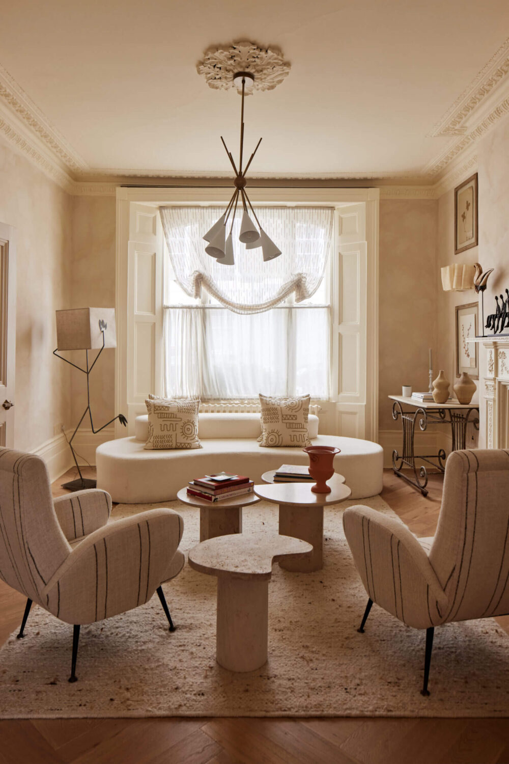 Limewash Paint and Artisan Wallpaper in a London Townhouse 8 serene living room curved sofa