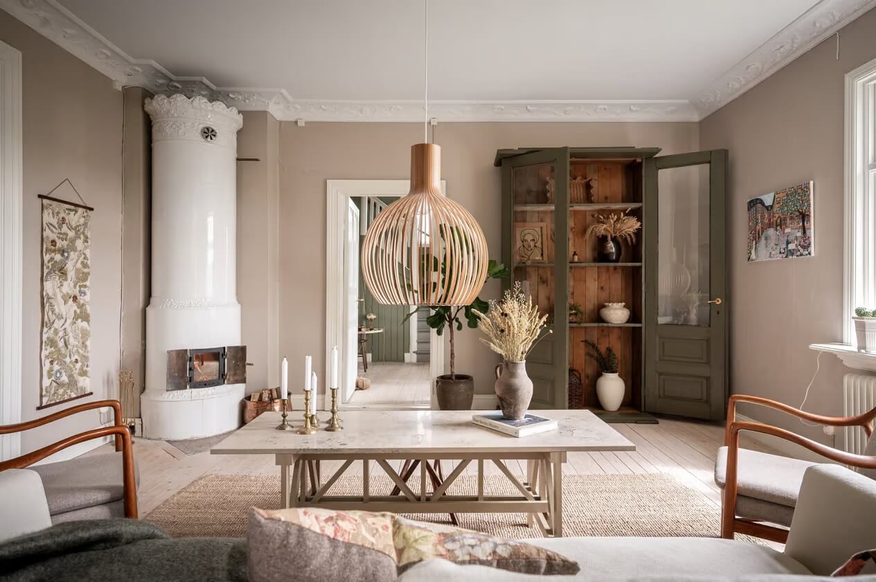 Original Charm in a Light Green Swedish Country House 4 serene living room fireplace