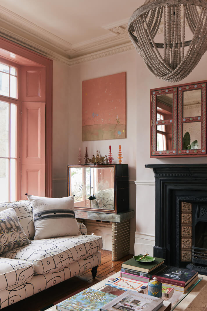 Limewash Paint and Artisan Wallpaper in a London Townhouse 6 sitting room black fireplace