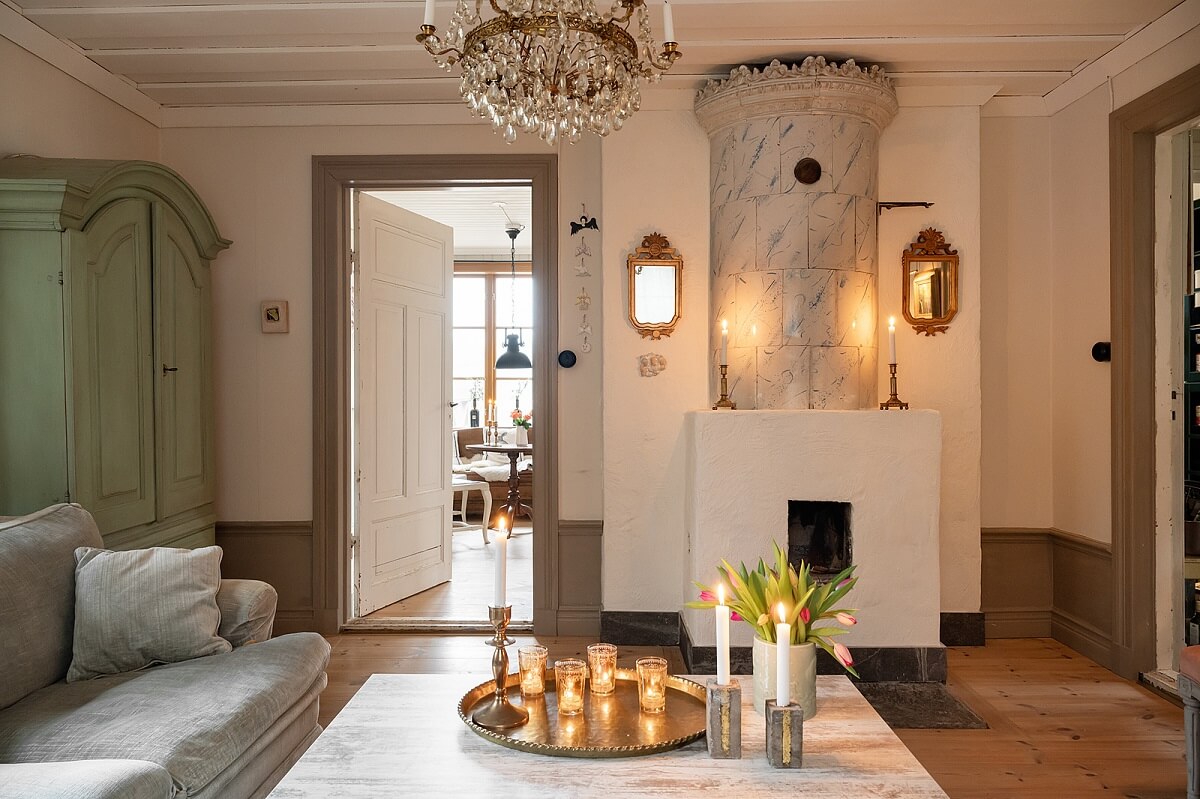 A Charming Historic Home with Views of the Lake 4 sitting room with historic fireplace