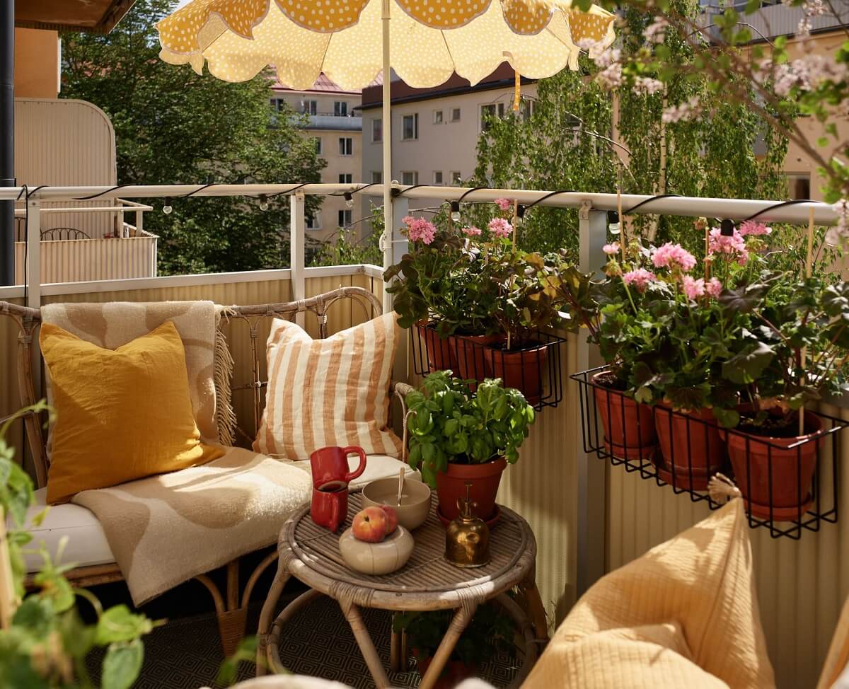 A Small Light Filled Apartment with Plants and Color 10 small balcony with plants