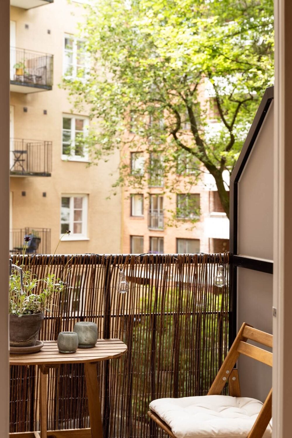 Warm Colors and Painted Ceilings in a Swedish Apartment 18 small courtyard balcony
