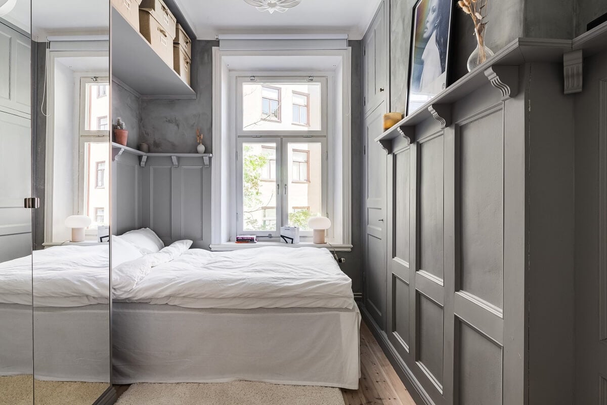A Small Stockholm Apartment with a Gray Bedroom & Sunny Balcony 9 small gray bedroom wardrobes with mirror doors