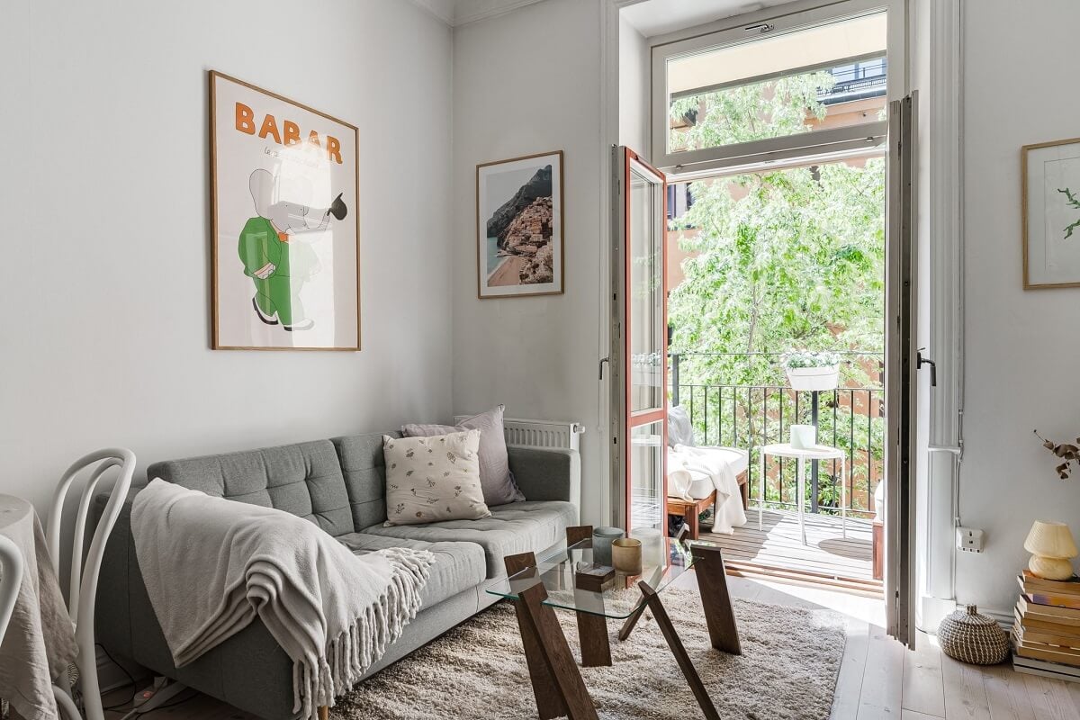 A Small Stockholm Apartment with a Gray Bedroom & Sunny Balcony 3 small living room with balcony