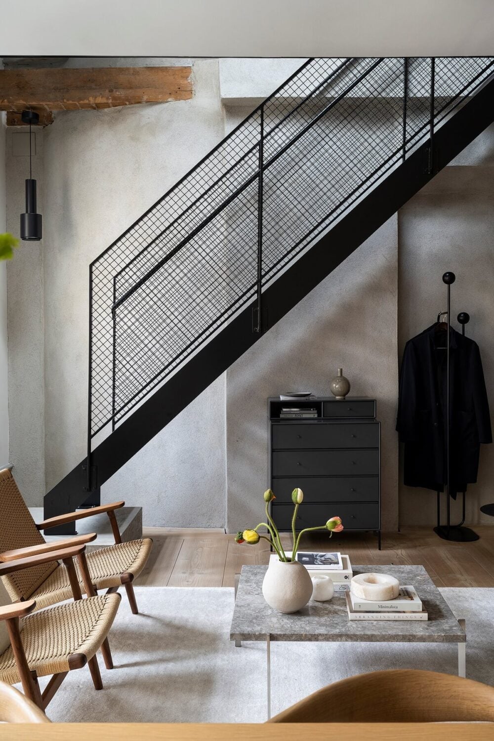 A Stylish Scandinavian Duplex with Custom-Made Cabinets 4 steel staricase