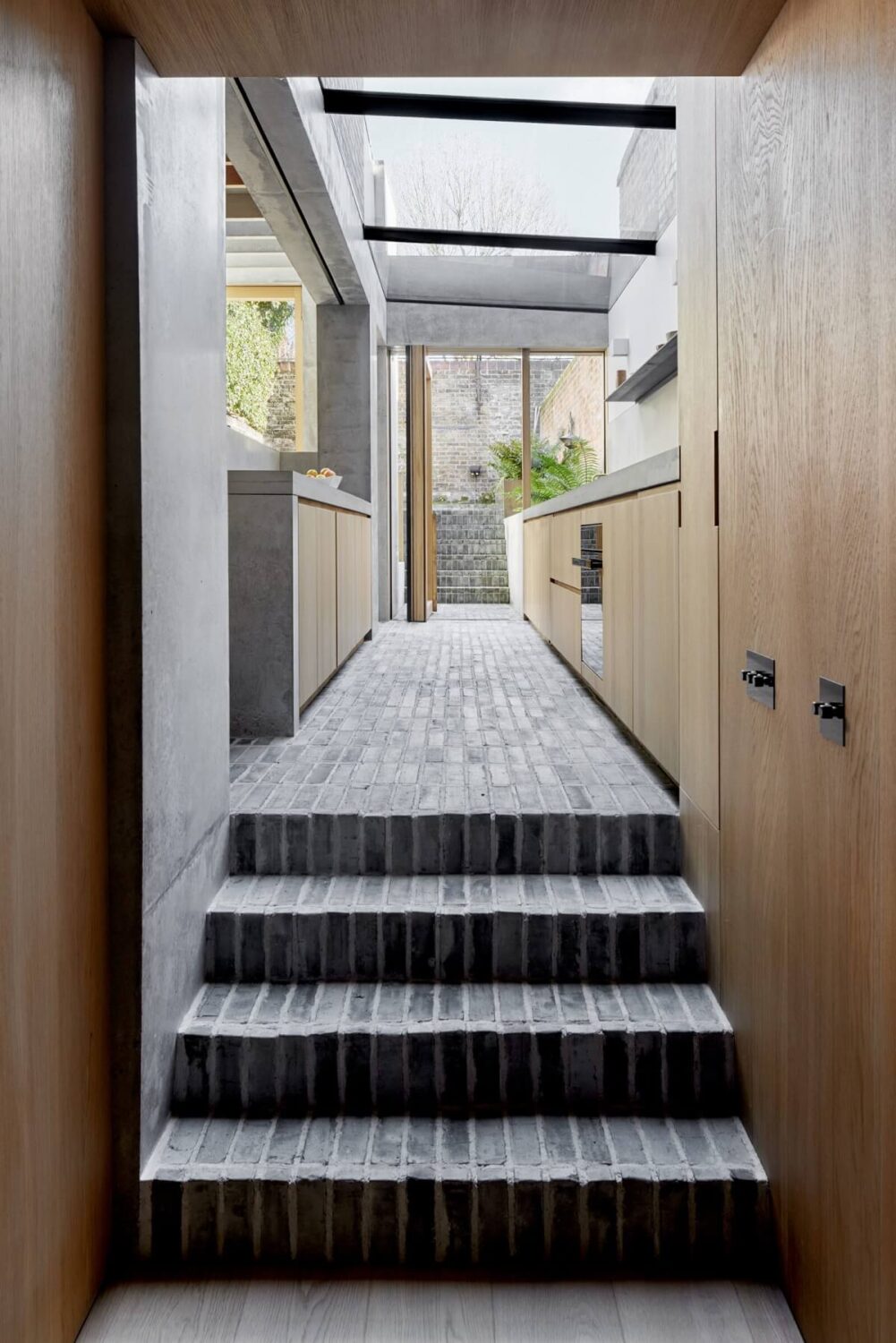 A Georgian Townhouse with a Modern Concrete Extension 14 stone steps to modern kitchen extension