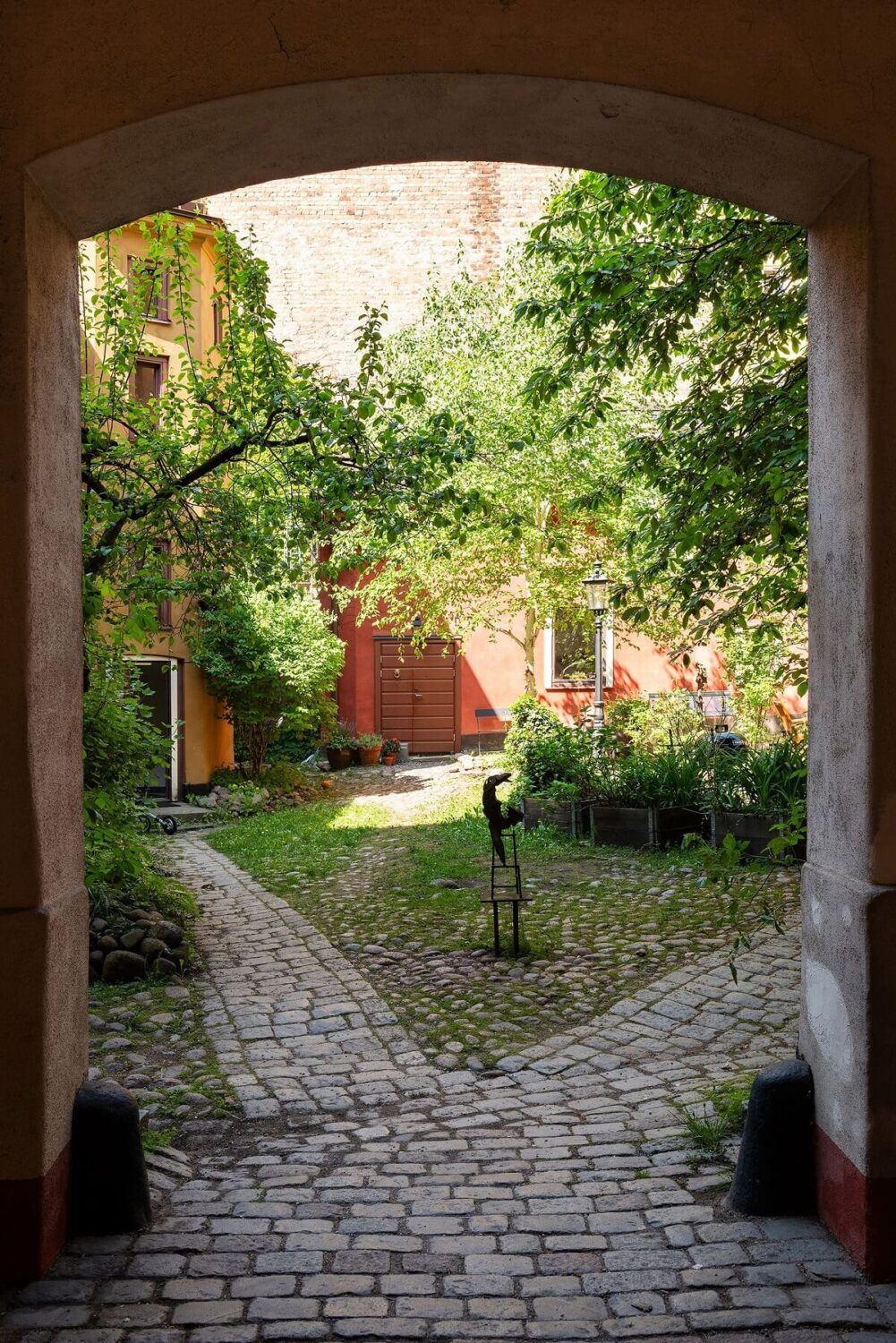 Light and Charming Rooms in a Historic Stockholm Apartment 23 swedish courtyard garden