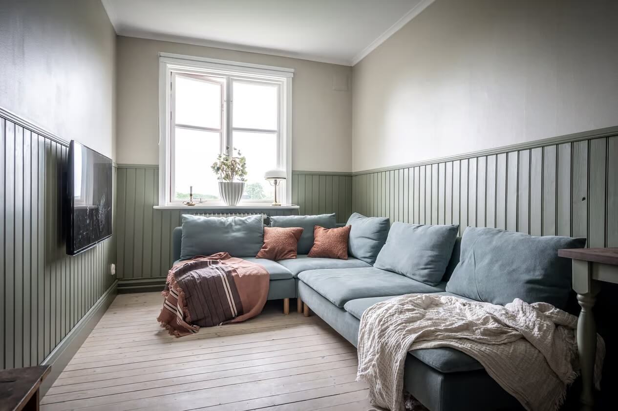 Original Charm in a Light Green Swedish Country House 18 television room