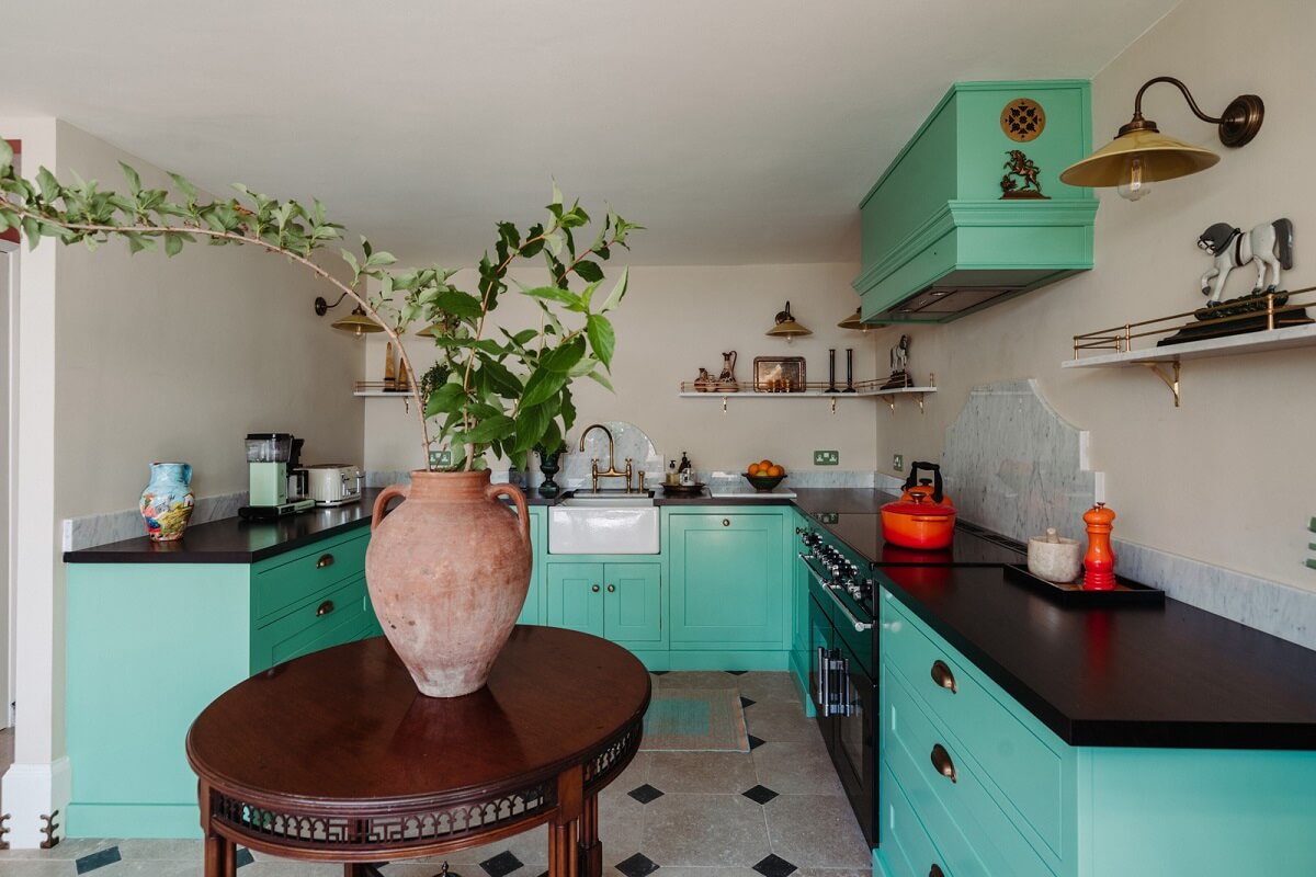 Rich Colors and Patterns in a London Townhouse 4 turquoise kitchen with round table