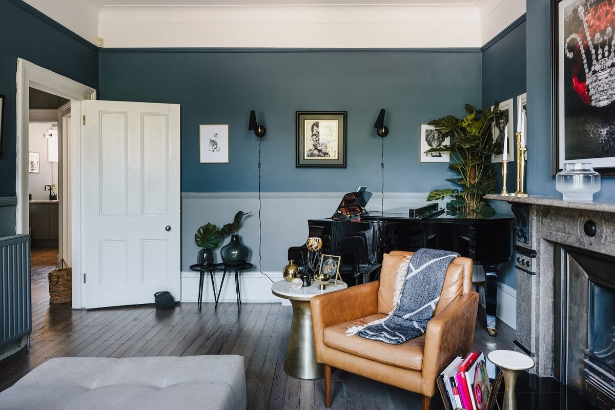 A Deep Blue Color Palette in a London Apartment 3 two tone blue walls living room