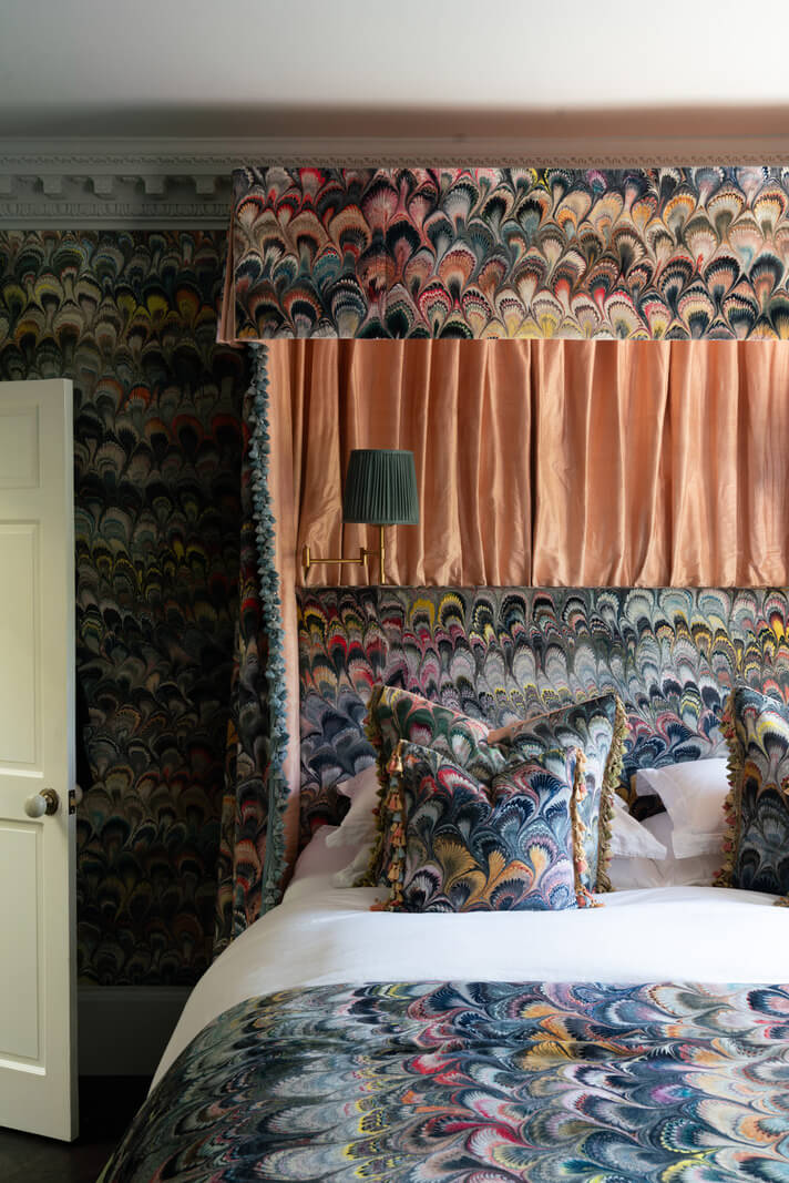 Rich Colors and Patterns in a London Townhouse 15 wallpapered bedroom with textured canopy bed