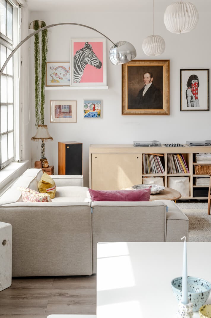 A Modern Scandinavian-Style Apartment in a Former London Mill 5 white sitting area with bookcases