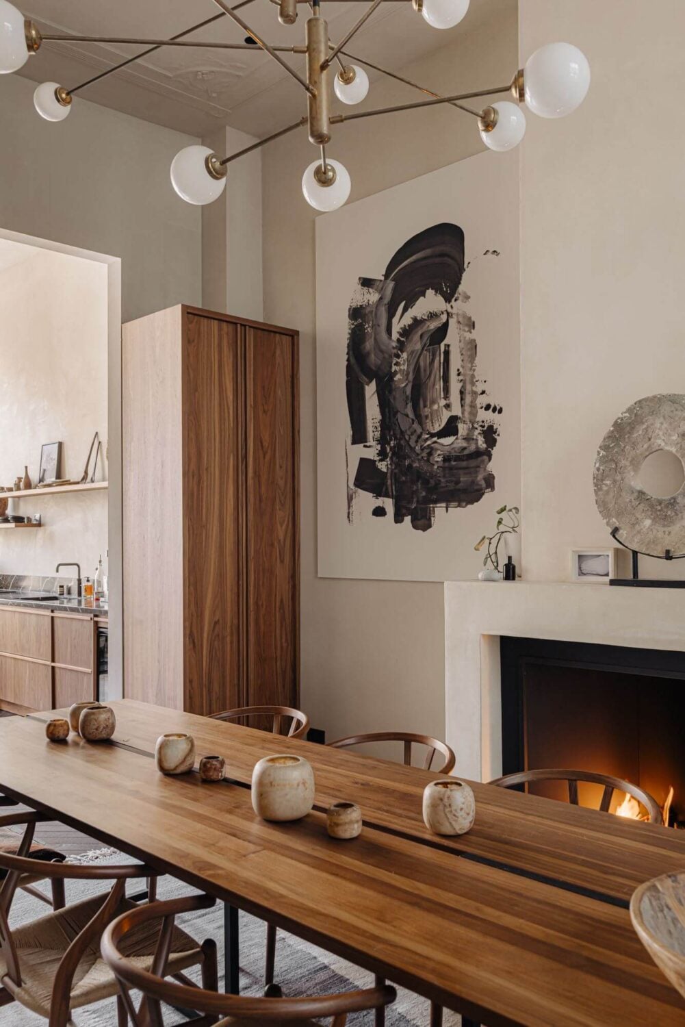 A Luxurious Apartment in an Amsterdam Canal House 4 wooden dining table with fireplace