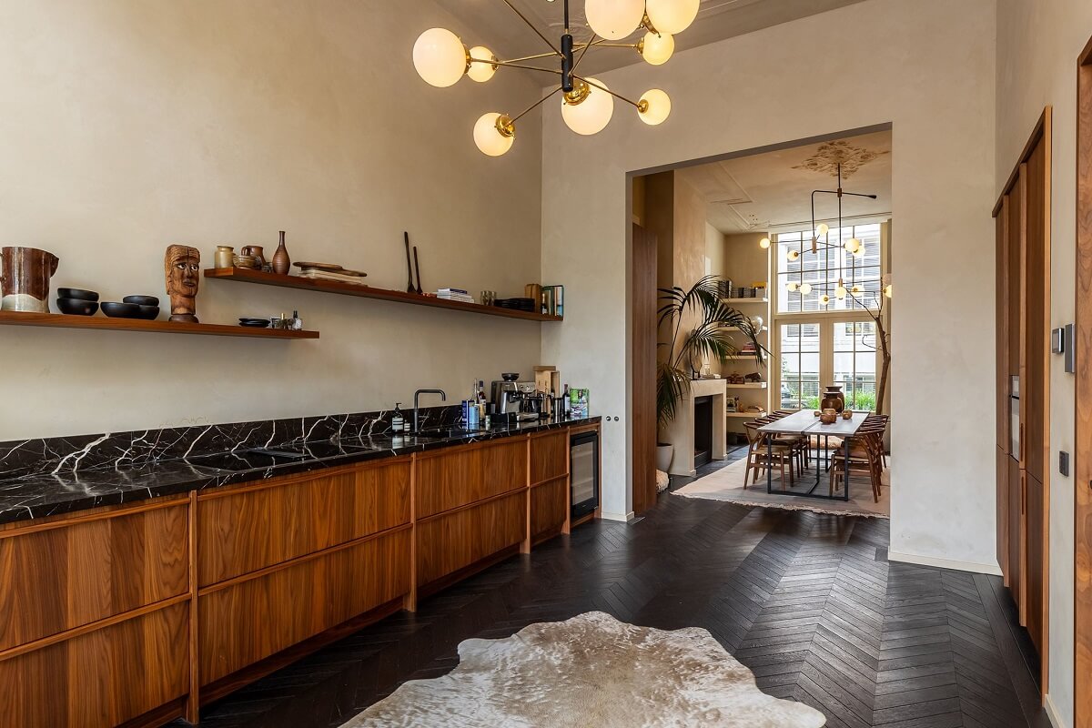 A Luxurious Apartment in an Amsterdam Canal House 5 wooden kitchen with black marble worktop