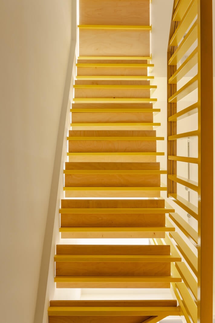 A London Terraced House with a Modern Kitchen Extension 15 yellow staircase