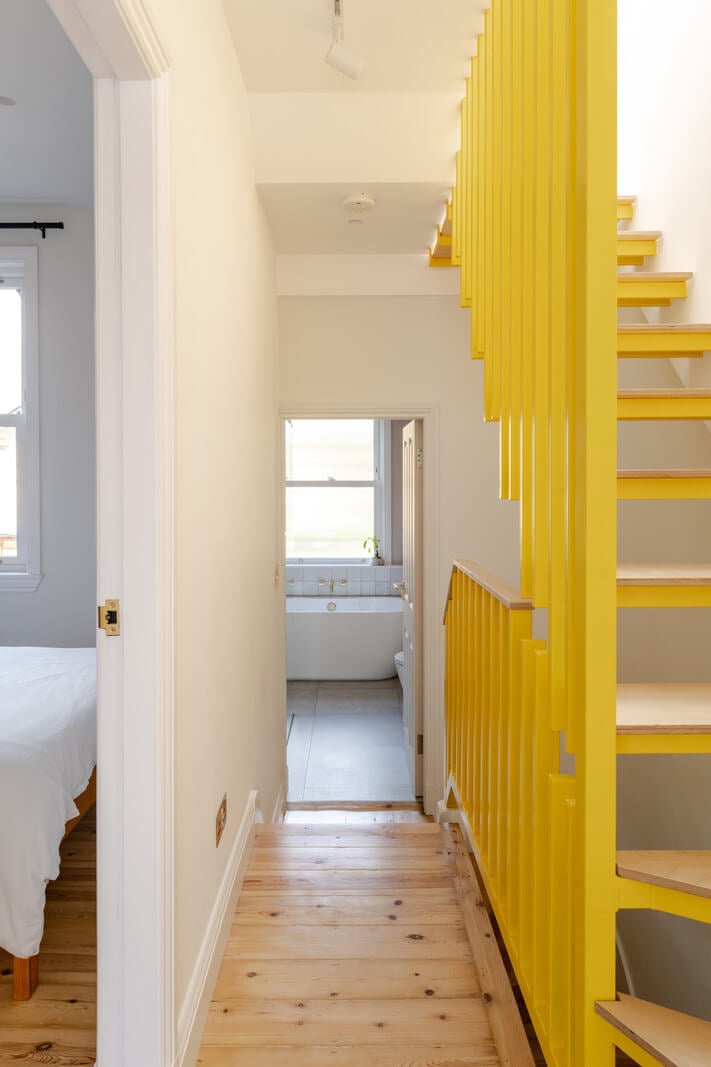 A London Terraced House with a Modern Kitchen Extension 14 yellow stairs