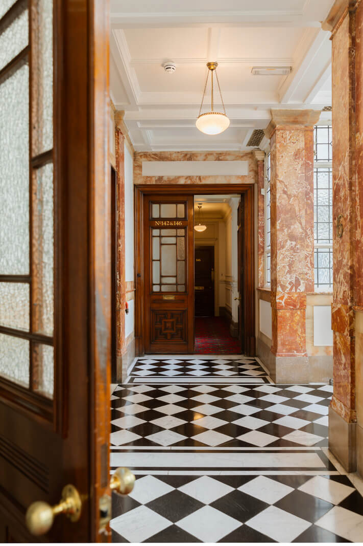 A Stylish Apartment in the Heart of London's Whitehall 17 apartment hallway black white checkerboard floor