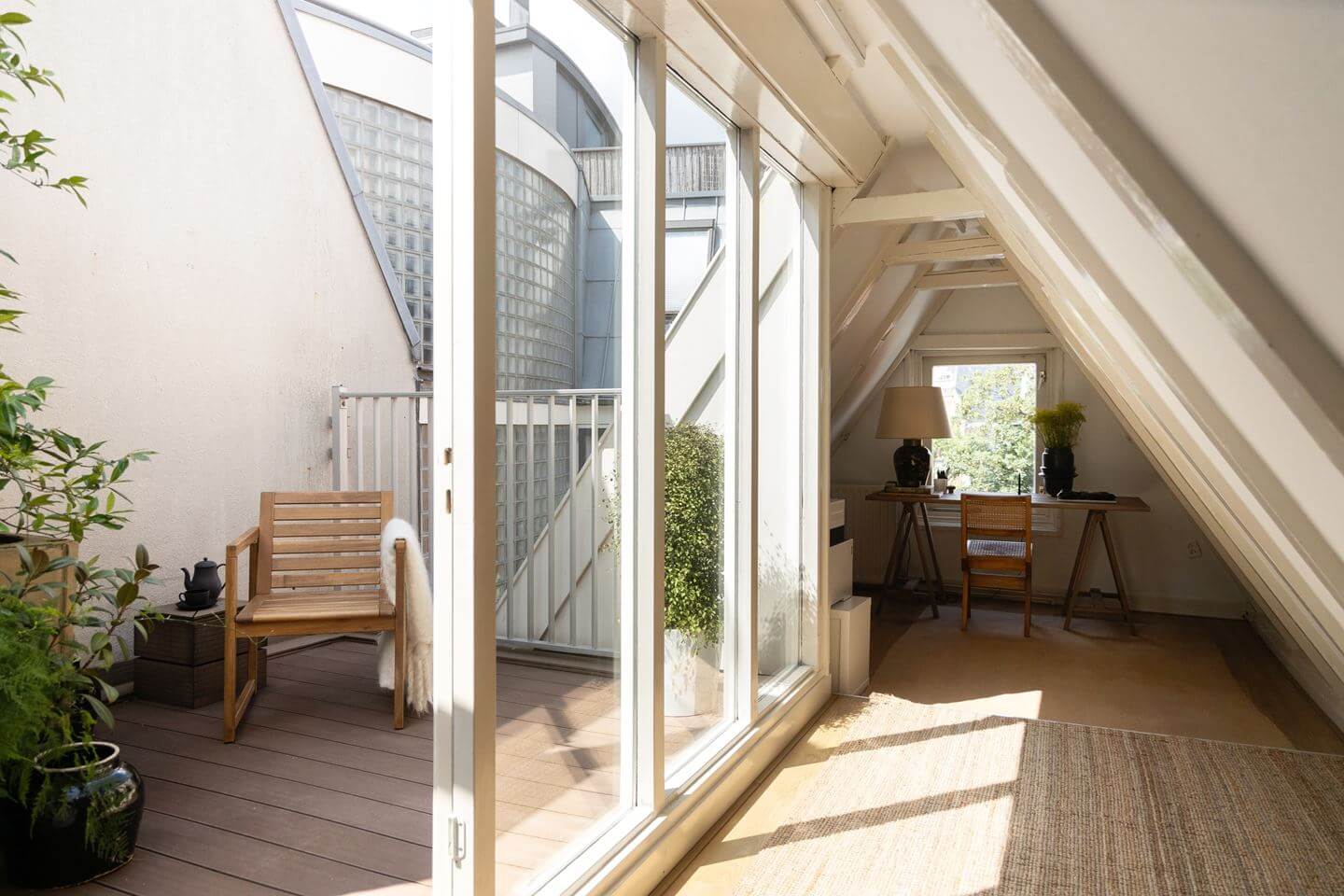 An Apartment with High Pitched Ceilings in an Amsterdam Canal House 17 attic room slanted ceiling home office