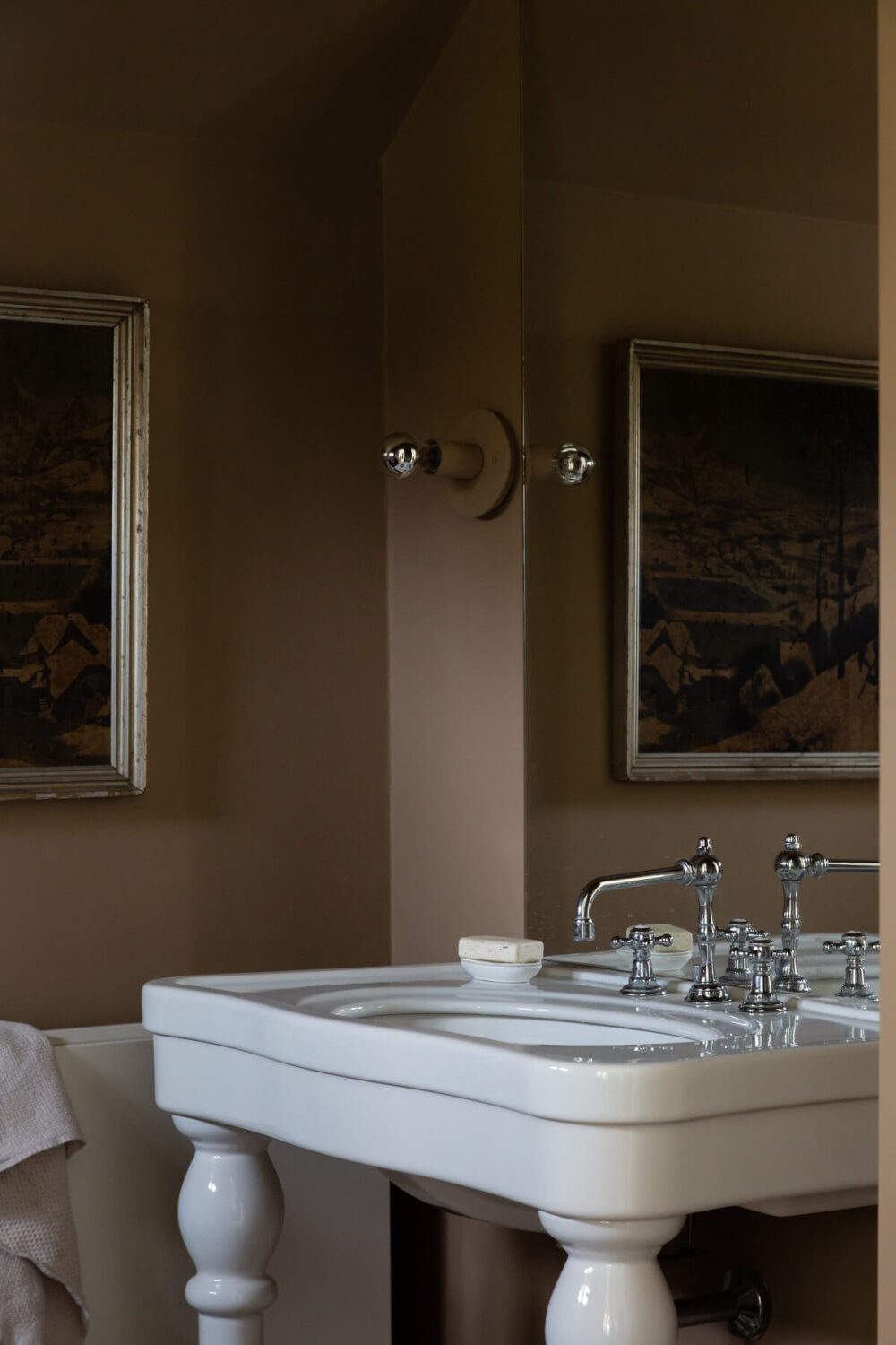 Historic Character and Timeless Elegant Interiors in a Restored Belgian Villa 19 bathroom brown walls and vintage sink