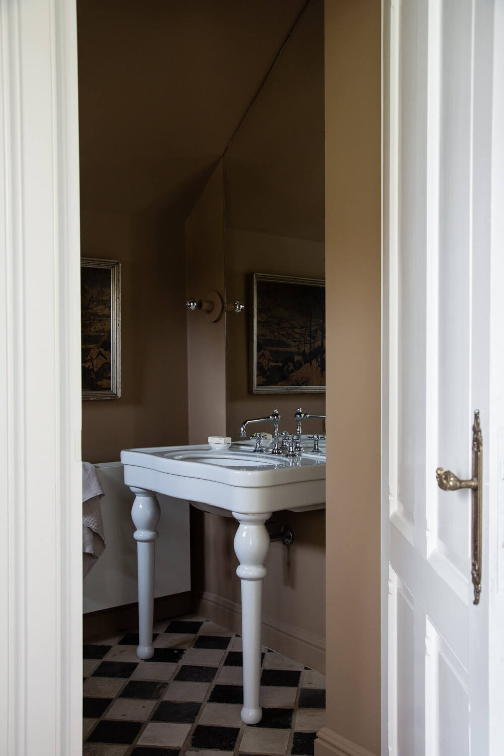 Historic Character and Timeless Elegant Interiors in a Restored Belgian Villa 18 bathroom checkerboard floor and pitched ceiling nordroom