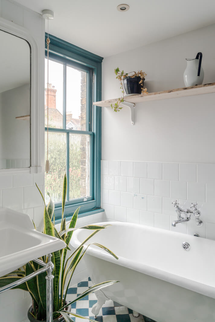 Pared-Back Interiors in a Late Victorian House 17 bathroom freestanding bath blue window frame nordroom
