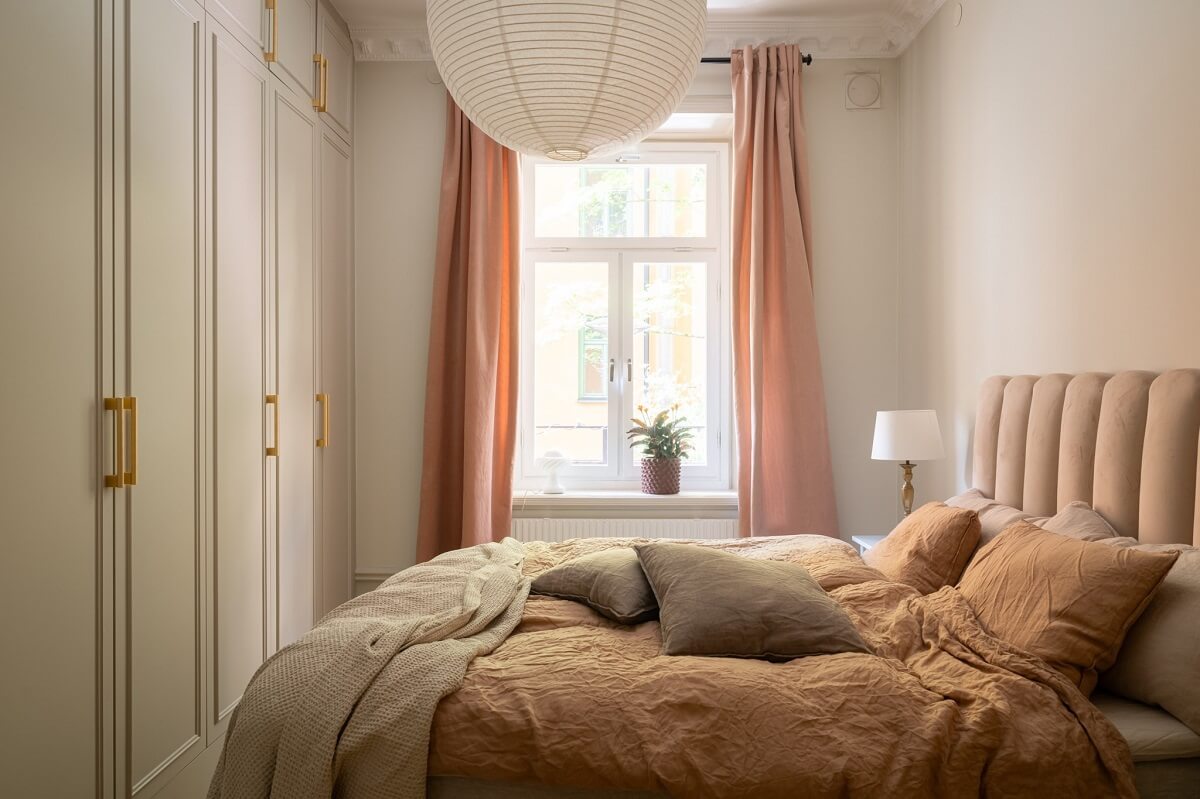 A Renovated Turn-of-the-Century Apartment with Two Bedrooms 16 bedroom built in wardrobes pink curtains
