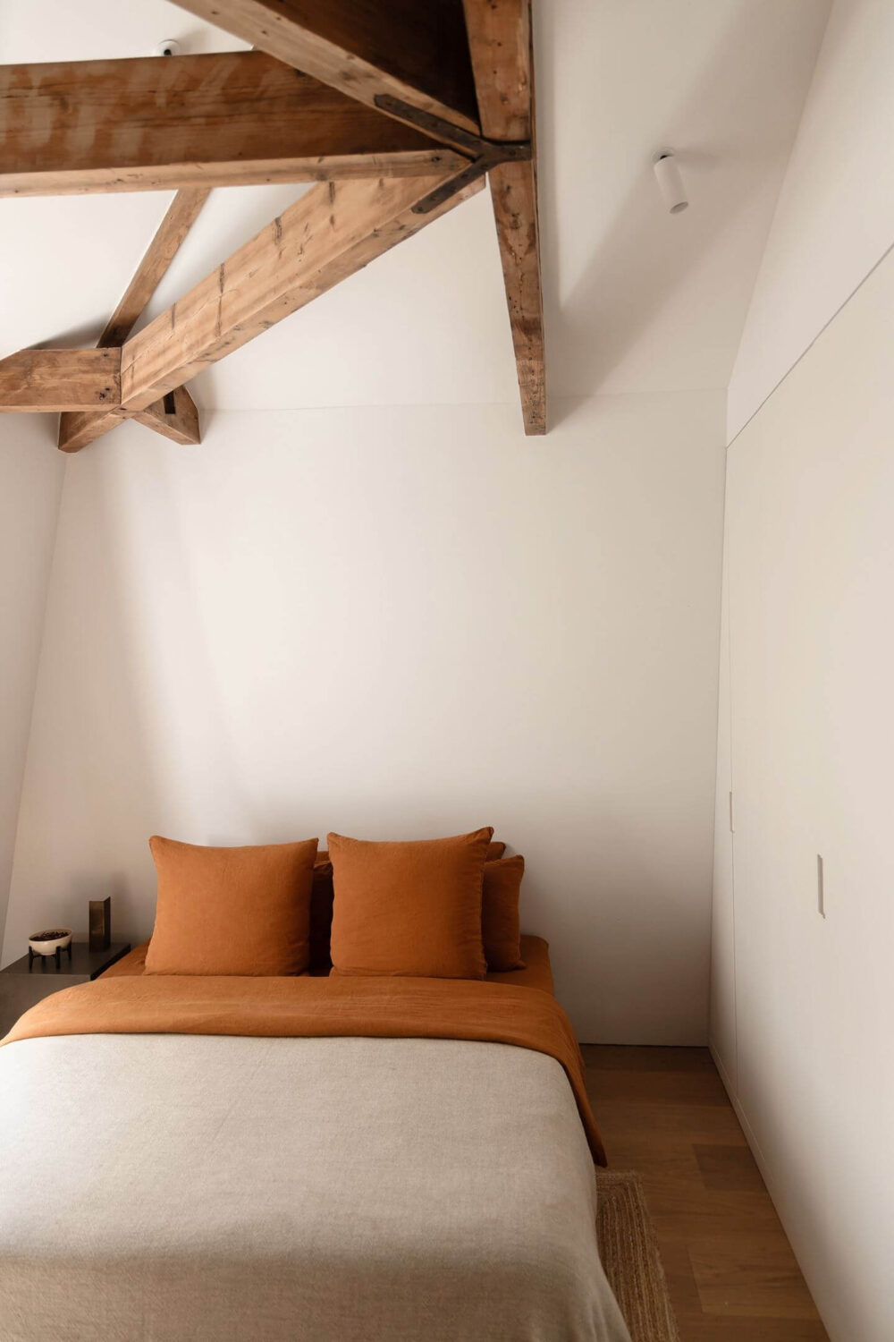 An Apartment with High Pitched Ceilings in an Amsterdam Canal House 12 bedroom exposed wooden beams built in wardrobes nordroom