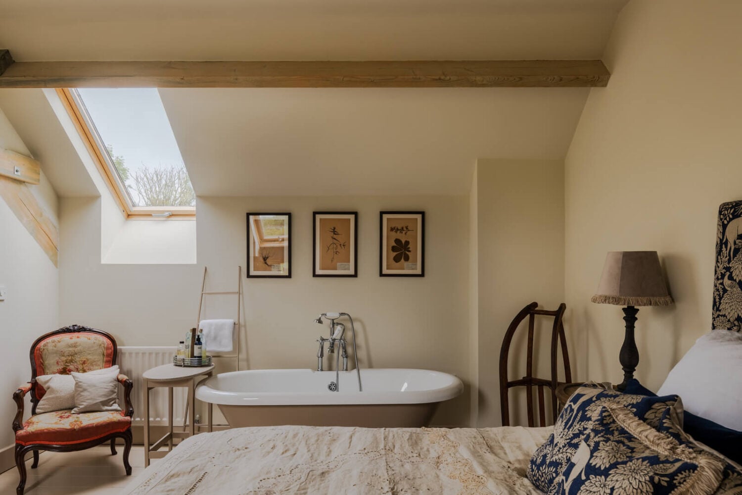 Cottage-Style Interiors in an English Barn Conversion 14 bedroom slanted ceiling and freestanding bath nordroom