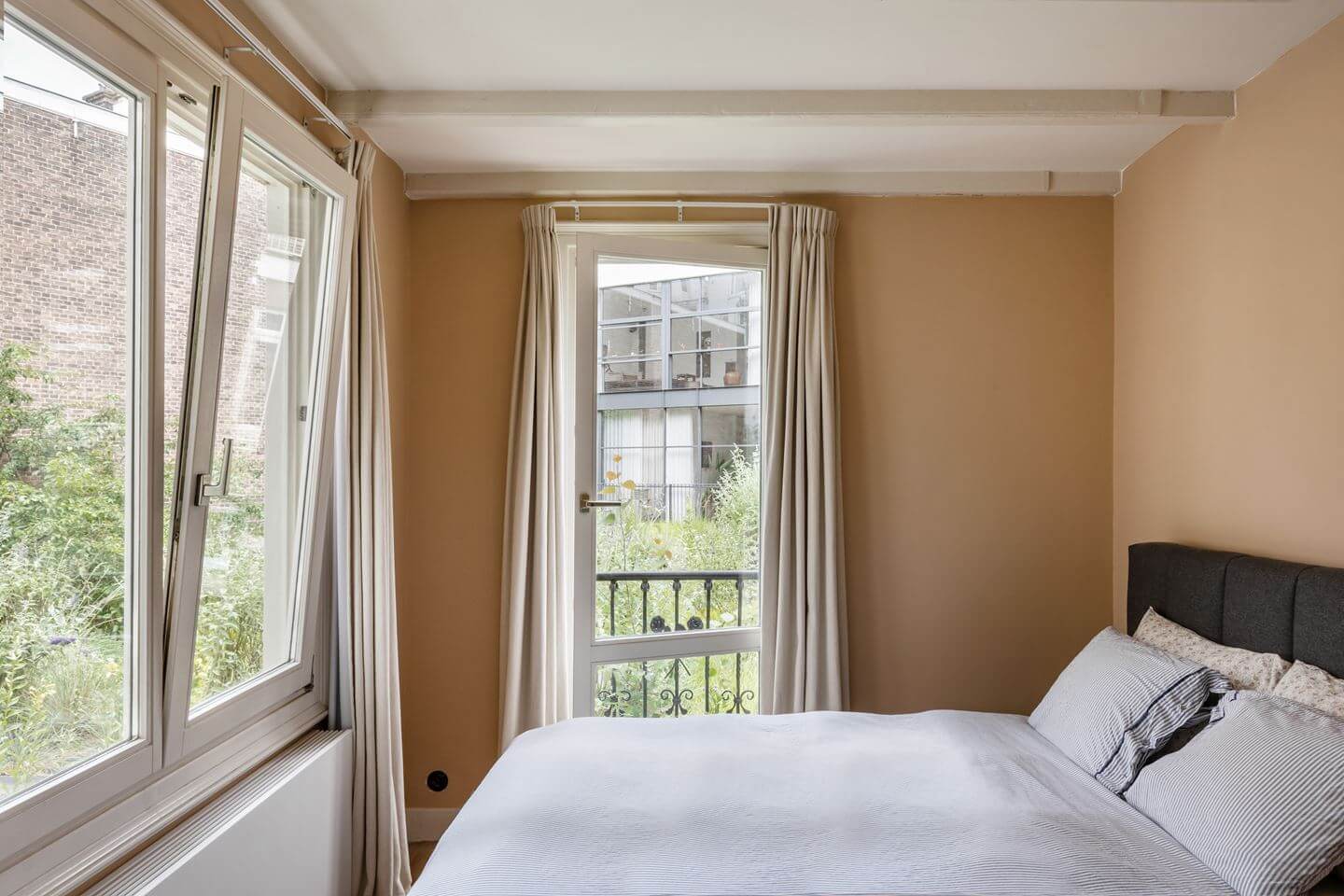 A Beautiful Renovated Duplex Apartment in Amsterdam 20 bedroom taupe walls
