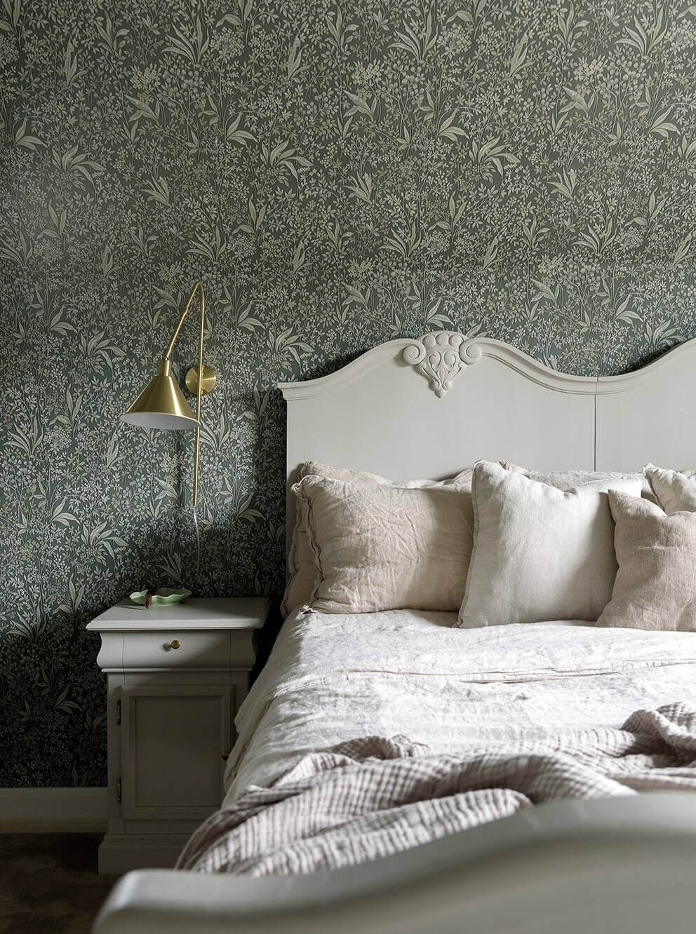 A Beautiful Family Home in a Grand 1930s Villa in Sweden 18 bedroom vintage bed and wallpaper