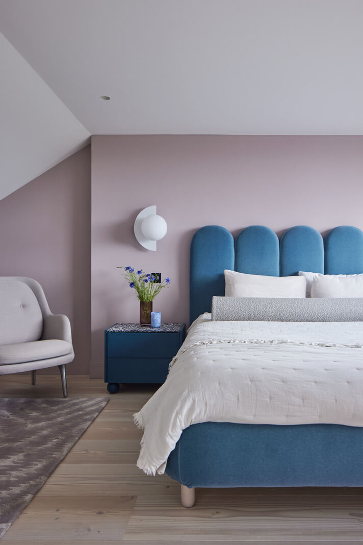 A London Family Home Decorated in Pastel Colors 22 bedroom with blue bedframe