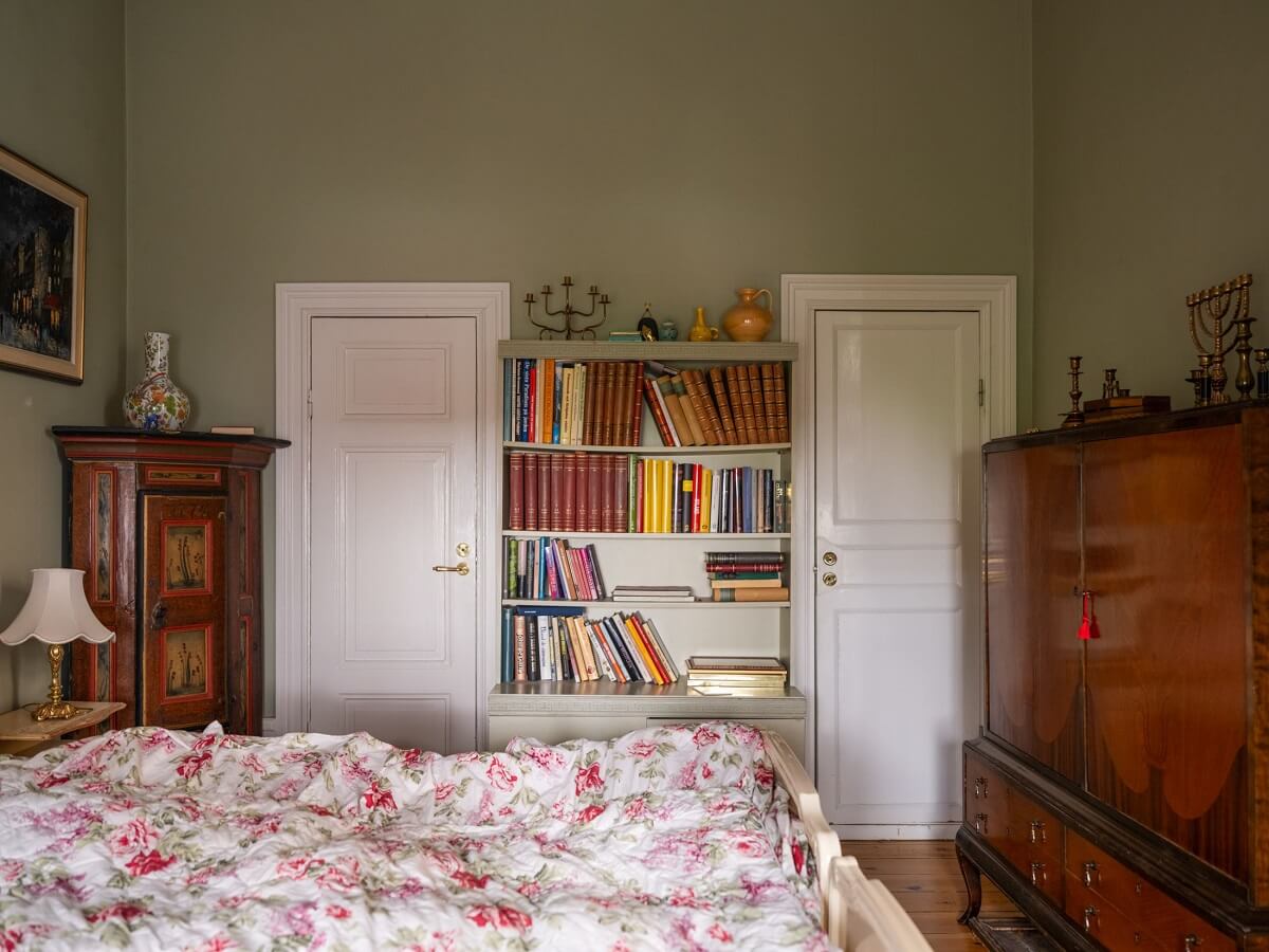 Antique Furniture and Arched Windows in a Stockholm Apartment 17 bedroom with built in shelves nordroom
