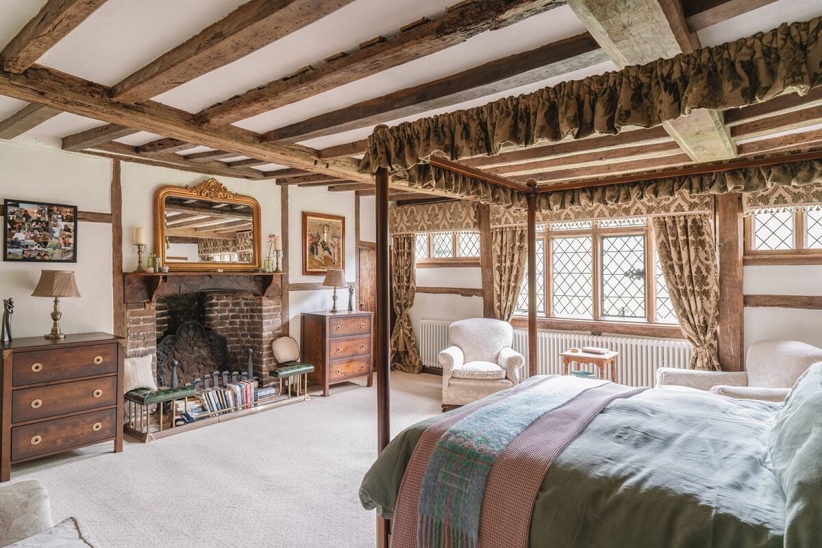 Magnificent Period Features in an English Tudor House 17 bedroom with canopy bed and wooden beams