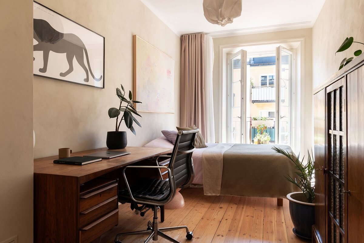 A Renovated Stockholm Apartment with Subtle Color Details 15 bedroom with desk