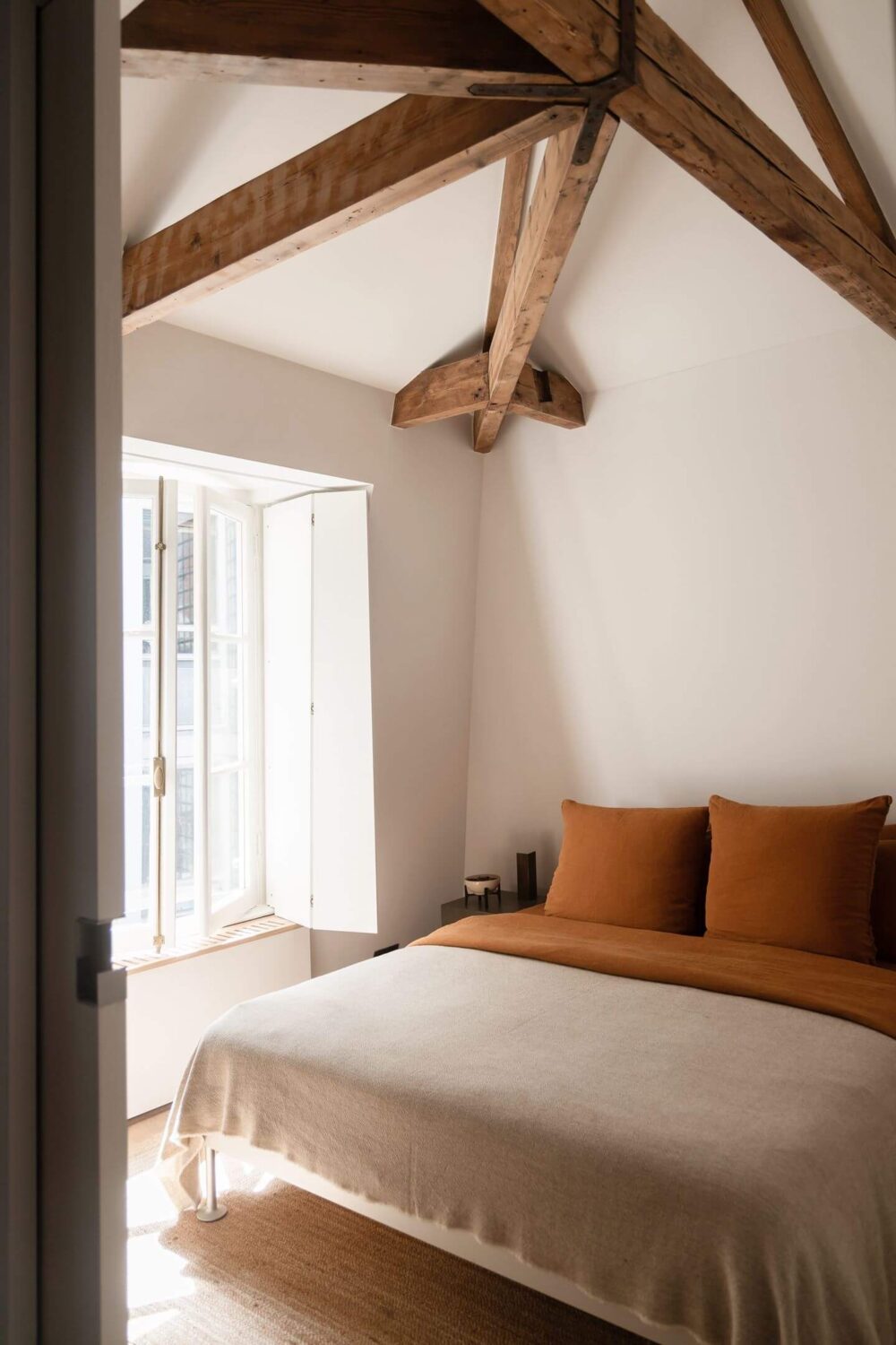 An Apartment with High Pitched Ceilings in an Amsterdam Canal House 11 bedroom with earthy textiled wooden beams nordroom