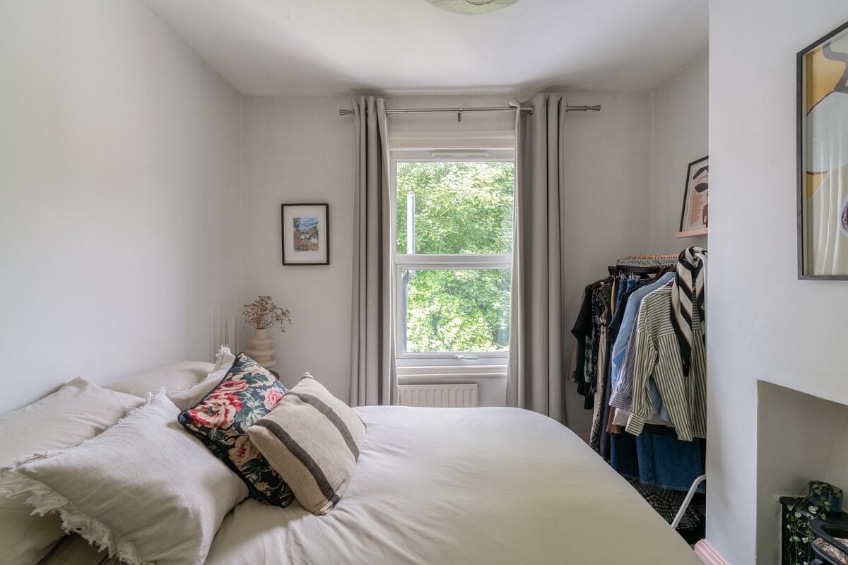 Blue Tones in a Two-Bedroom Victorian Cottage 12 bedroom with fireplace
