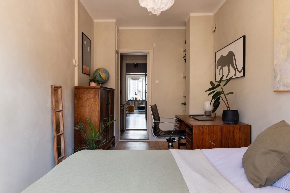A Renovated Stockholm Apartment with Subtle Color Details 19 bedroom with home office