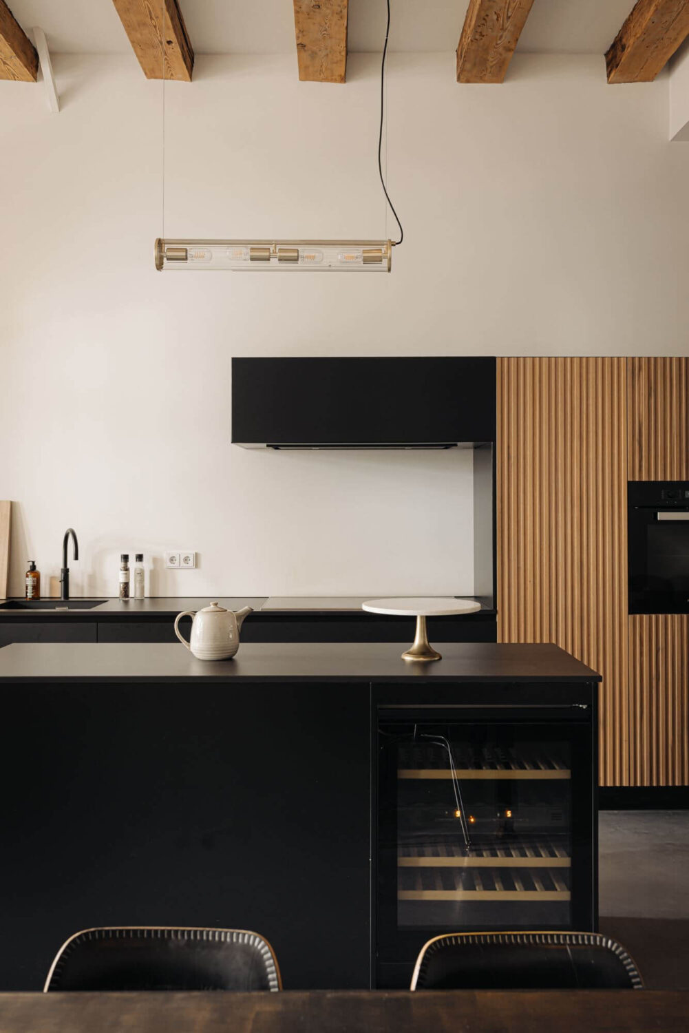 A Modern Apartment in an 18th Century Amsterdam Canal House 12 black kitchen