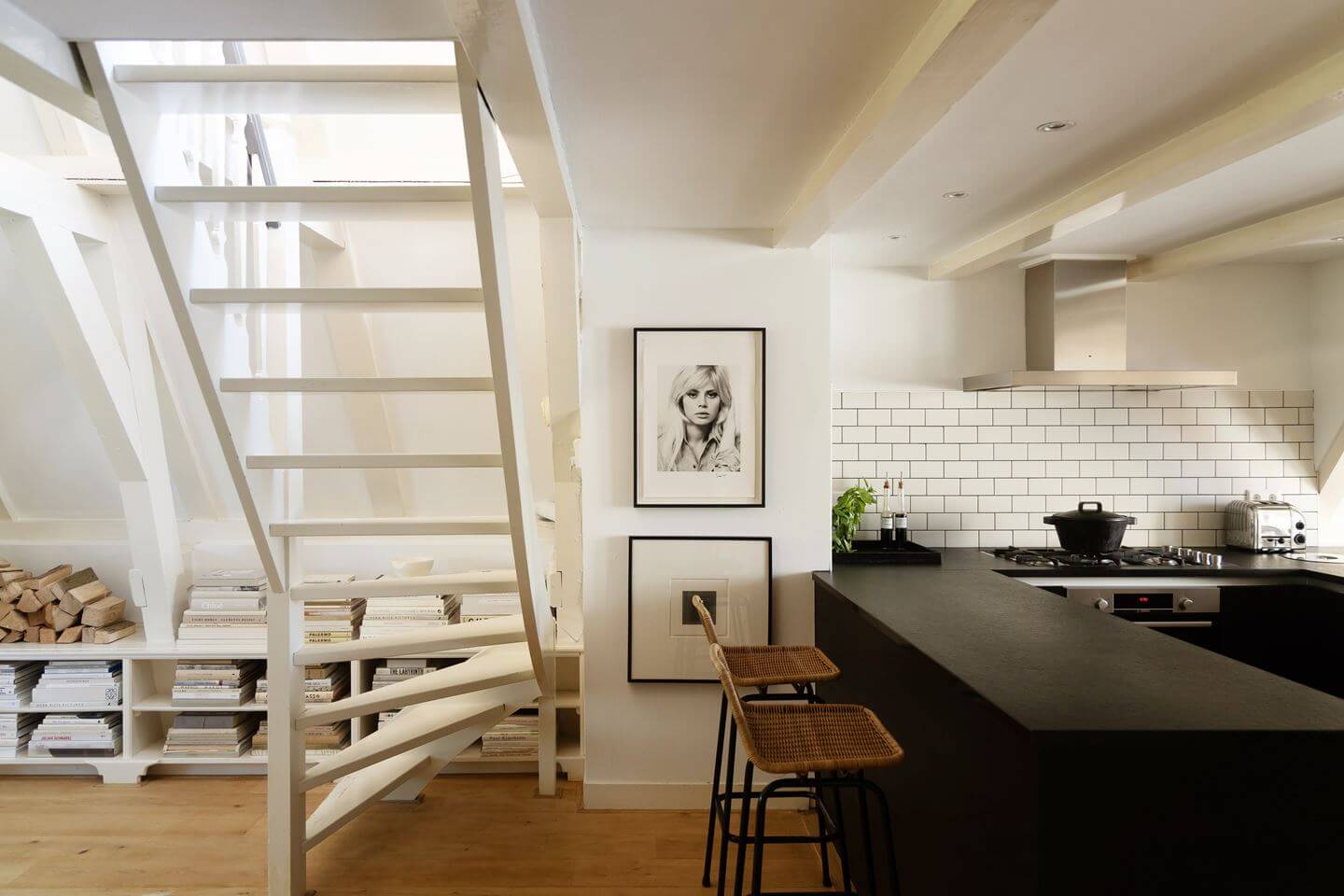 An Apartment with High Pitched Ceilings in an Amsterdam Canal House 5 black kitchen amsterdam apartment
