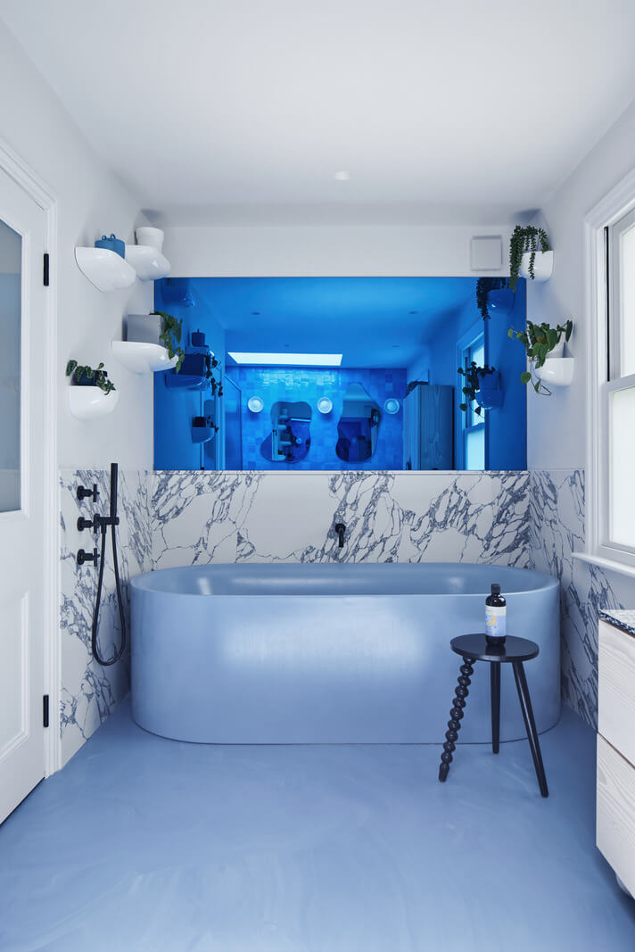 A London Family Home Decorated in Pastel Colors 24 blue bath and floor in bathroom