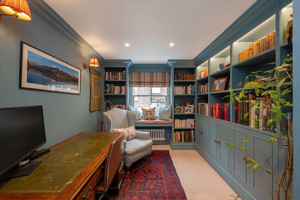 Cottage-style Interiors in a London Family Home 11 blue home office built in bookcases